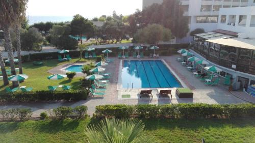 Petaloudes Hotel | Experience Pylea Beach Hotel: Oceanfront Bliss Awaits