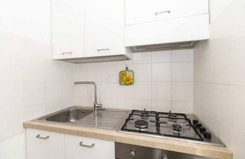 Mirafiori Apartment | Comfortable Pythagoras Flat with Balcony and Kitchen Access