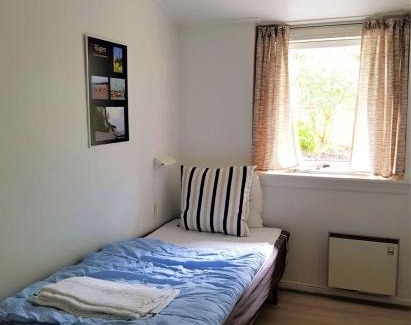 Gudhjem Apartment | Guest Rated Pyttegården Apartments with Oceanfront Views