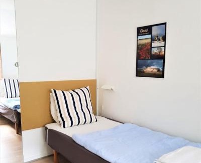 Gudhjem Apartment | Guest Rated Pyttegården Apartments with Oceanfront Views