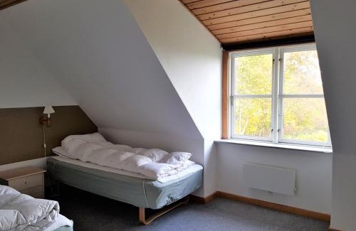 Gudhjem Apartment | Guest Rated Pyttegården Apartments with Oceanfront Views