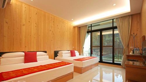 Lugu House | Family-Friendly Qian's Garden Inn with Kitchen & Accessibility