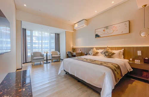 Yuexiu Hotel | Budget-Friendly Stay at QL HOTEL with Family Amenities