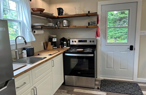 West Quaco Cottage | Pet-Friendly Quaco Cottages - Oceanfront Bliss Awaits