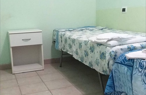 Pineto Bed & Breakfast | Cozy Quadruple Room Steps from the Sea for Your Getaway