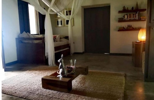 Minca Hotel | Relaxing Quadruple Room with Garden View and Spa Access