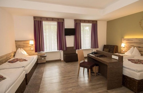 Muehlau Hotel | Family-Friendly Quadruple Room at Hotel Dollinger
