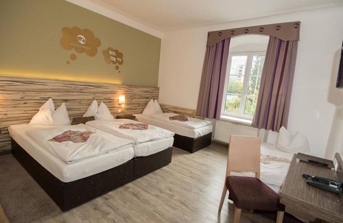 Muehlau Hotel | Family-Friendly Quadruple Room at Hotel Dollinger