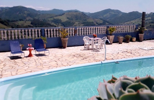 Extrema House | Discover QUADRUPULO CHALET - Your Cozy Getaway Awaits
