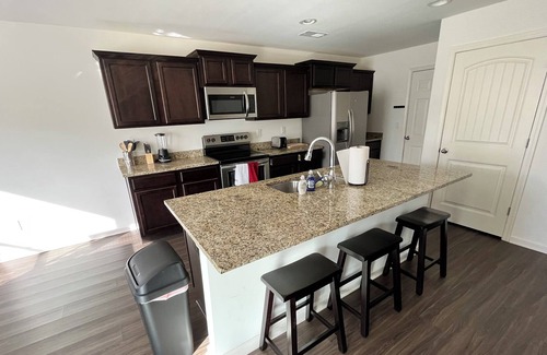 Fultondale House | Quaint 4-bedroom home with garage and driveway parking