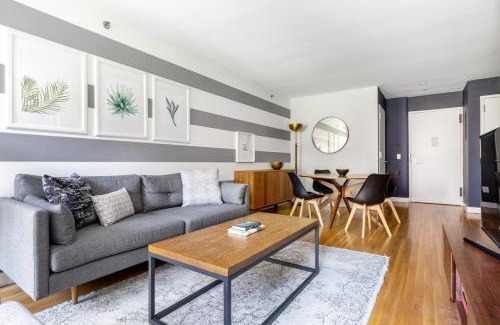 Midtown South Apartment | Charming Chelsea 1BR with Doorman, Gym & Balcony in NYC