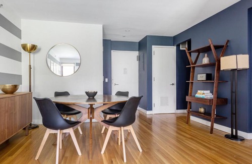 Midtown South Apartment | Charming Chelsea 1BR with Doorman, Gym & Balcony in NYC