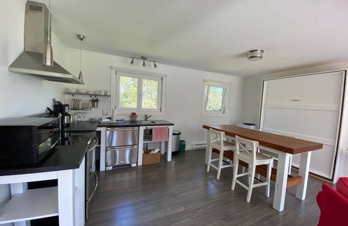 Baddeck Cottage | Cozy Coastal Cottage with Spa & Ocean Views in Baddeck