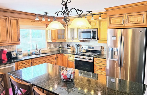 Greenwich House | Cozy Duplex with Private Yard - Steps to Beach & Dining!