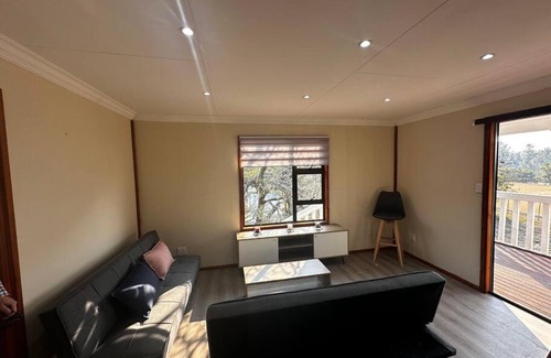 Lanseria Apartment | Cozy Log Cabin Retreat - Pet & Child Friendly Getaway