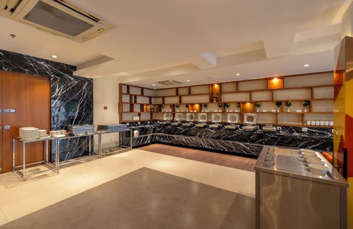 Rajkot Apartment | Discover Patria Suites: Guest Rated 9.2 with Pool & Spa