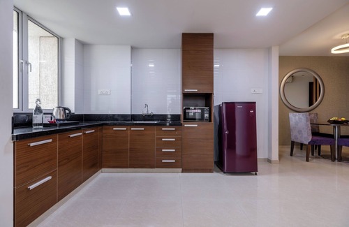 Rajkot Apartment | Discover Patria Suites: Guest Rated 9.2 with Pool & Spa