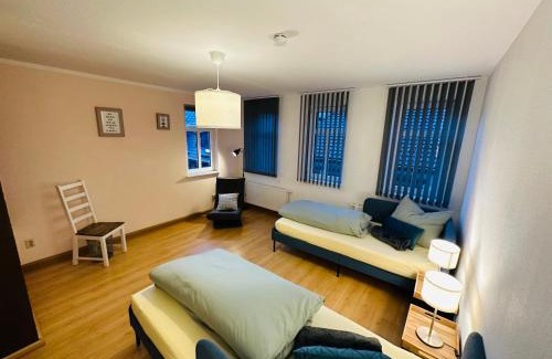 Suhl Apartment | Quartier48: Ideal Stadtapartments for Families or Groups