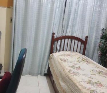 Del Castilho Apartment | Cozy Shared Room in Delcastilho - Perfect for Families