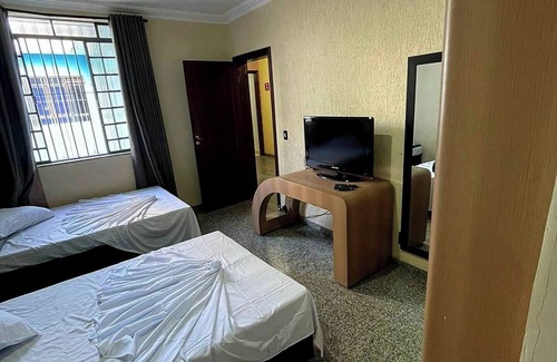 Liberdade Bed & Breakfast | Family Room 13: TV, Fridge & Breakfast Included