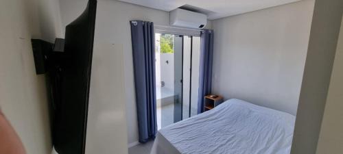 Ribeirao da Ilha Apartment | Comfortable Rooms Just 5 Minutes from the Airport