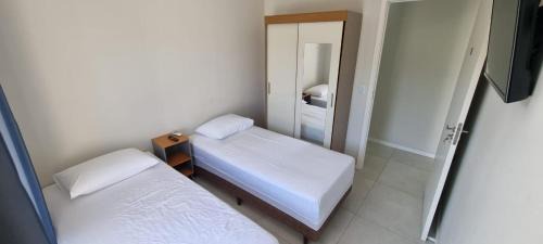 Ribeirao da Ilha Apartment | Comfortable Rooms Just 5 Minutes from the Airport