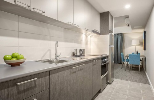 Liverpool Apartment | Relax at Quest Liverpool: 4-Star Comfort with Spa & Dining