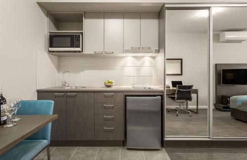 Liverpool Apartment | Relax at Quest Liverpool: 4-Star Comfort with Spa & Dining