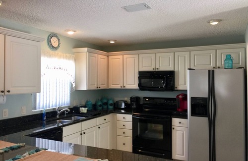 Virginia Trace House | Convenient Lake Sumter Landing Access with Golf Cart & Pool