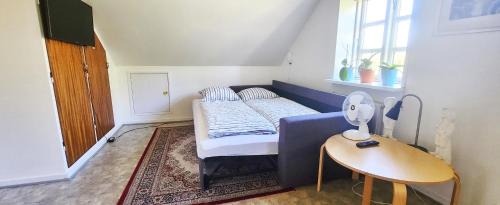 Tilst Apartment | Serene Apartment Nestled in Nature, Perfect for Families