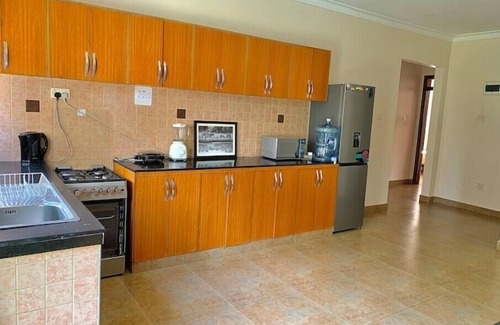 Kampala House | Serene Hidden Gem with Pool and Ocean Views