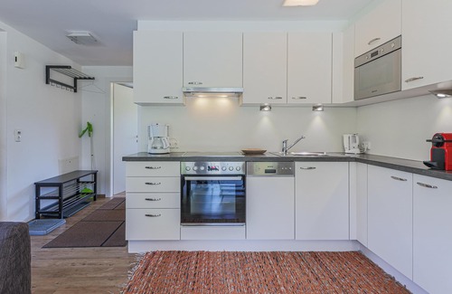 Sankt Johann in Tirol Apartment | Tranquil Apartment with Terrace and Breakfast Included