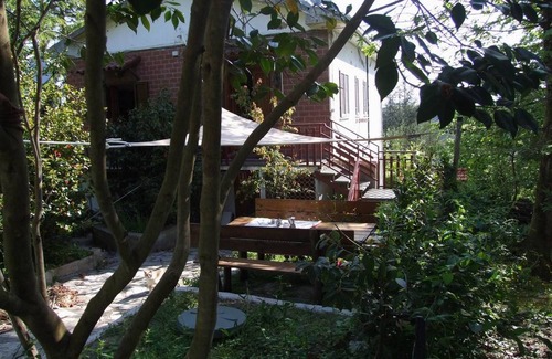 Val Canina Apartment | Peaceful Apartment with Garden, Pets Welcome & Spa Access