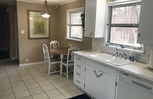 Jones Mills House | Tranquil Lake Front Retreat with Spa & Hot Tub Amenities
