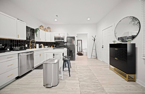 North-Central Cottage | Serene Cottage with Hot Tub in Downtown's Heart