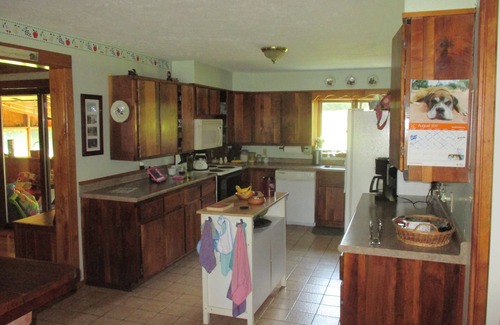 Parish House | Tranquil Log Home with Scenic Ponds and Spa Amenities