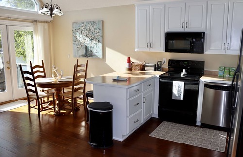 Hardwick House | Tranquil Cove Lakefront Retreat with Spa and Hot Tub