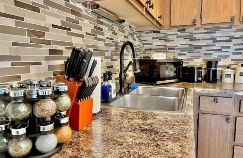 Orange Prairie Apartment | Cozy 2BR Apartment with Eco-Friendly Amenities & Hot Tub
