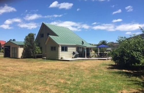 Matarangi House | Tranquil Retreat in Matarangi with Pool and Family Amenities