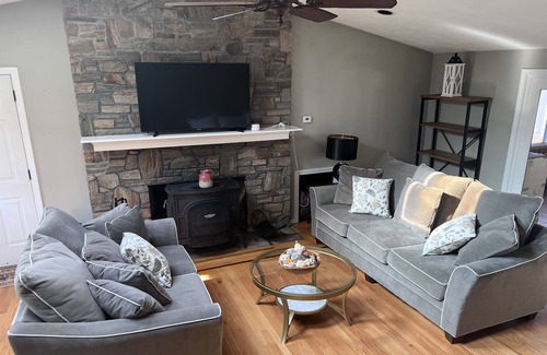 Coventry House | Serene Lakefront Escape with Family-Friendly Amenities