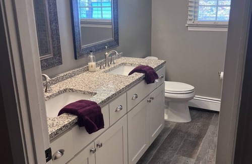 Coventry House | Serene Lakefront Escape with Family-Friendly Amenities