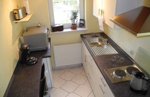 Schwanheim Apartment | Discover Peaceful Rooms in Frankfurt with Great Amenities