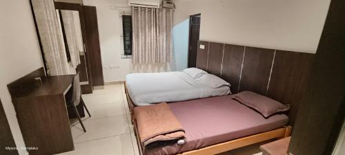 Mysore Hotel | Quin Hotel: Family-Friendly with Breakfast & Hot Tub Amenities
