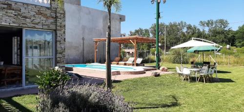 La Reja House | Tranquil Nature Retreat with Pool and Ocean Views
