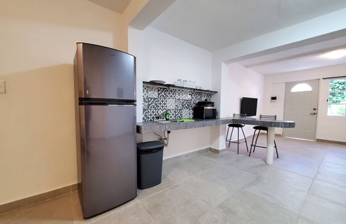 Colonia Centro Apartment | Top-Rated Quinta Suites: Relax by the Pool and Spa