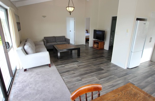 Omaha House | Charming Kiwi Bach with Ocean View and Pet-Friendly Amenities