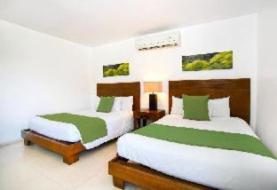 Majahual Hotel | Oceanfront Retreat at Quinto Sole by GuruHotel, 4-Star Stay