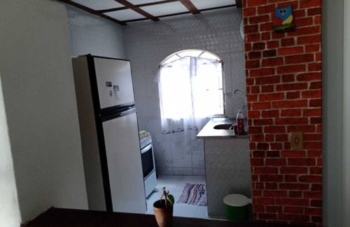 Araruama Apartment | Gaviao Lagoon Kitchenette: Oceanfront Family Retreat