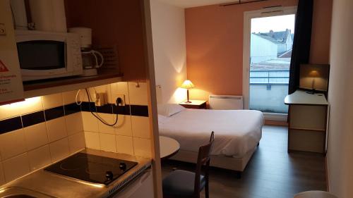 Margny-les-Compiegne Apartment | Discover Family-Friendly Stay at Résidence Hôtelière Poincaré