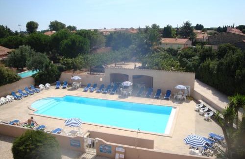 Claira Apartment | Oceanfront Family Retreat at Résidence L'Orangeraie
